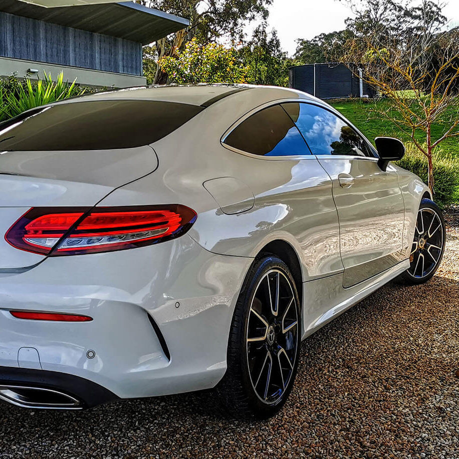 white mazda rear view